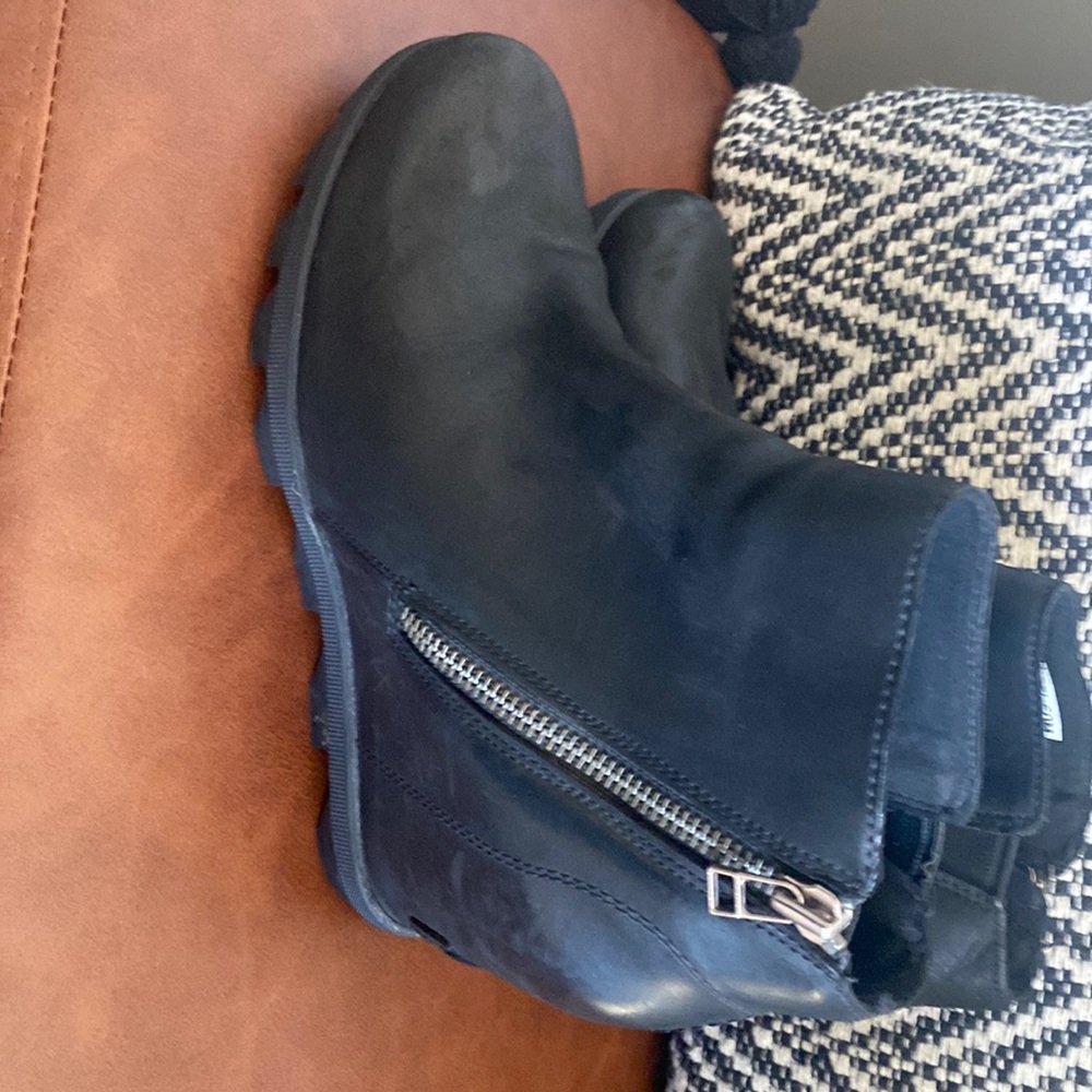 Black leather Sorel boots.  Size 9.  Excellent condition